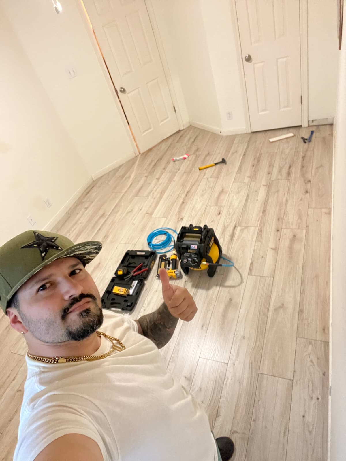 After — finished laminate, hallway view
